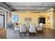 Bright dining room featuring modern furnishings and stylish decor, lit by a chandelier at 2100 16Th St # 606, Denver, CO 80202