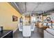 Open dining area with seating for eight, adjacent to the kitchen with stainless steel appliances at 2100 16Th St # 606, Denver, CO 80202