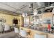Spacious kitchen with stainless steel appliances and granite countertops, open to the dining area at 2100 16Th St # 606, Denver, CO 80202