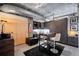 Spacious open area featuring concrete ceilings, a well-equipped desk, and modern decor at 2100 16Th St # 606, Denver, CO 80202
