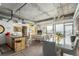 Open-concept living area with modern design, exposed ductwork, and city views at 2100 16Th St # 606, Denver, CO 80202