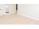 Spacious bedroom with modern floors and neutral wall color at 3728 W Exposition Ave, Denver, CO 80219
