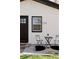 Charming home exterior featuring a cozy patio with a small table and chairs, great for relaxing outdoors at 3728 W Exposition Ave, Denver, CO 80219