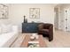 Bright living room featuring stylish decor, modern furniture, and an open layout perfect for entertaining at 3728 W Exposition Ave, Denver, CO 80219