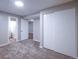 Neutral bedroom with a large closet and illuminated by a modern ceiling light at 11937 Claude Ct, Northglenn, CO 80233