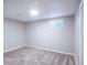 A carpeted bedroom with a single window and neutral color walls at 11937 Claude Ct, Northglenn, CO 80233