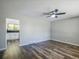 Open living area features wood flooring, natural light, and neutral paint, creating a welcoming space at 11937 Claude Ct, Northglenn, CO 80233