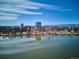 Scenic view with high-rise condo visible by the lake, offering a blend of nature and city living at 4200 W 17Th Ave # 223, Denver, CO 80204
