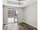 Bedroom with tray ceiling and large sliding glass door that leads to a large terrace at 4200 W 17Th Ave # 223, Denver, CO 80204