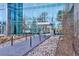 Exterior shot of Lakehouse entrance with modern walkway and attractive landscaping at 4200 W 17Th Ave # 223, Denver, CO 80204