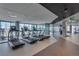 Bright gym with several treadmills, exercise bikes, and an array of weight machines overlooking a beautiful outdoor view at 4200 W 17Th Ave # 223, Denver, CO 80204