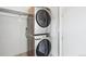 Laundry area with stacked washer and dryer at 4200 W 17Th Ave # 223, Denver, CO 80204