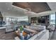 Elegant resident lounge with comfortable seating, stylish decor, and access to outdoor amenities at 4200 W 17Th Ave # 223, Denver, CO 80204