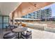 Outdoor kitchen with multiple grills and seating; an ideal place to enjoy outdoor cooking and dining at 4200 W 17Th Ave # 223, Denver, CO 80204