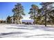 Luxury home on snow covered lot with distant city view at 21531 Main Ave, Golden, CO 80401