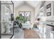 Spa-like bathroom with clawfoot tub, double vanity, and window views at 21531 Main Ave, Golden, CO 80401