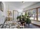 Charming bedroom with white metal bed frame and large window at 21531 Main Ave, Golden, CO 80401