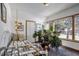 Bright bedroom with a large window and vintage decor at 21531 Main Ave, Golden, CO 80401