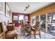 Dining room with large windows and view to outside living and dining space at 21531 Main Ave, Golden, CO 80401