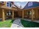 Inviting front entrance with stone pathway and charming porch seating at 21531 Main Ave, Golden, CO 80401