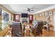 Living room with stone fireplace, hardwood floors, and comfortable seating at 21531 Main Ave, Golden, CO 80401