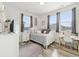 Cozy bedroom with ample natural light and comfortable furniture, great for relaxing and getting some sleep at 24747 E Calhoun Pl # C, Aurora, CO 80016