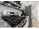 Close up view of stainless steel stove and appliances in modern kitchen at 24747 E Calhoun Pl # C, Aurora, CO 80016