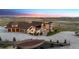 Stunning estate showcasing a spacious driveway, three-car garage, and stone detailing at 12565 Picadilly Rd, Commerce City, CO 80022