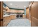Bright laundry room with built-in cabinets, a sink, and modern washer and dryer units at 12565 Picadilly Rd, Commerce City, CO 80022
