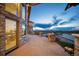 Elegant outdoor terrace featuring stone balustrade and scenic views at 12565 Picadilly Rd, Commerce City, CO 80022