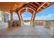 Outdoor patio with timber ceiling detailing offering scenic views at 12565 Picadilly Rd, Commerce City, CO 80022