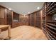 Impressive wine cellar with custom wood racking and ample storage at 12565 Picadilly Rd, Commerce City, CO 80022