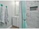 Stylish bathroom with a marble-tiled shower and a modern vanity at 9 N Waterloo St, Aurora, CO 80018