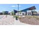 Modern clubhouse exterior with sleek architectural design and inviting outdoor spaces at 9 N Waterloo St, Aurora, CO 80018