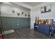 Inviting entryway features hardwood floors, stylish console table, and decorative wall art at 9 N Waterloo St, Aurora, CO 80018