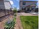 Beautiful landscaping with flowers and mulch, enhancing the home's curb appeal and outdoor aesthetic at 9 N Waterloo St, Aurora, CO 80018