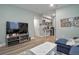 Relaxing living room with comfortable seating and a mini kitchenette at 9 N Waterloo St, Aurora, CO 80018