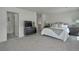 Serene main bedroom boasts neutral tones, soft carpet, and an ensuite bathroom at 9 N Waterloo St, Aurora, CO 80018