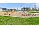 Community playground featuring a variety of play equipment and a grassy area at 9 N Waterloo St, Aurora, CO 80018