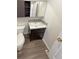 Bathroom with vanity and wood-look flooring at 1885 S Quebec Way # B23, Denver, CO 80231
