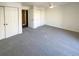Spacious bedroom with grey carpet and double door closets at 1885 S Quebec Way # B23, Denver, CO 80231