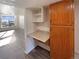 Kitchen with built-in desk and extra storage at 1885 S Quebec Way # B23, Denver, CO 80231