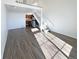 Open concept living room with loft and kitchen views at 1885 S Quebec Way # B23, Denver, CO 80231