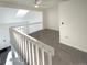 Loft area with carpet and skylight at 1885 S Quebec Way # B23, Denver, CO 80231