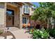 Charming front porch with stone accents, seating, and a welcoming entrance with floral wreath at 11433 Decatur Ct, Westminster, CO 80234