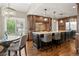 Gourmet kitchen with large island and adjacent eat-in dining area at 11433 Decatur Ct, Westminster, CO 80234
