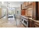Bright kitchen with breakfast nook, granite countertops, and stainless steel appliances at 11433 Decatur Ct, Westminster, CO 80234