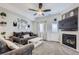 Cozy living room with fireplace, neutral tones, and stylish decor for a relaxing ambiance at 2235 Coronado Pkwy # A, Denver, CO 80229