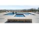 Modern pool and spa area with comfortable lounge chairs and picturesque views at 3148 Keep Dr, Sedalia, CO 80135