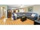 Spacious living room with hardwood floors and a large, comfortable sectional sofa at 2461 Niagara St, Denver, CO 80207